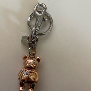 Coach Bear keychain and two B&BW crisp morning air hand sanitizer